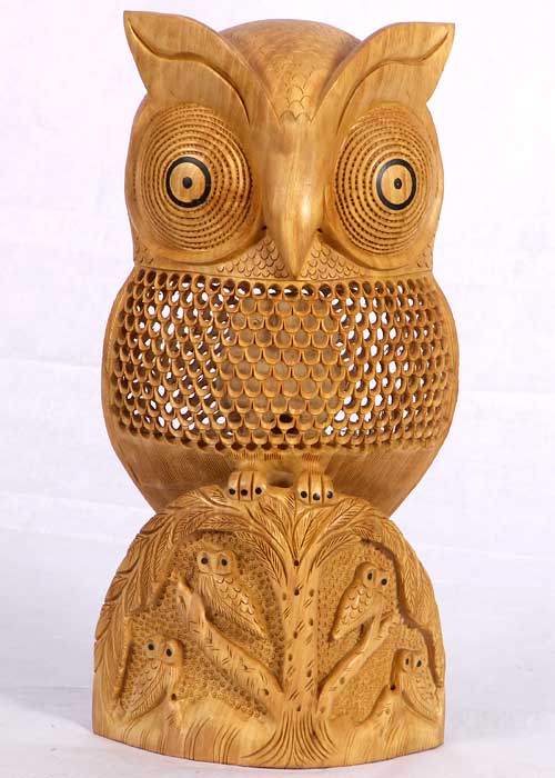 Wooden Owls on Branches