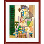 Seated woman in front of a window